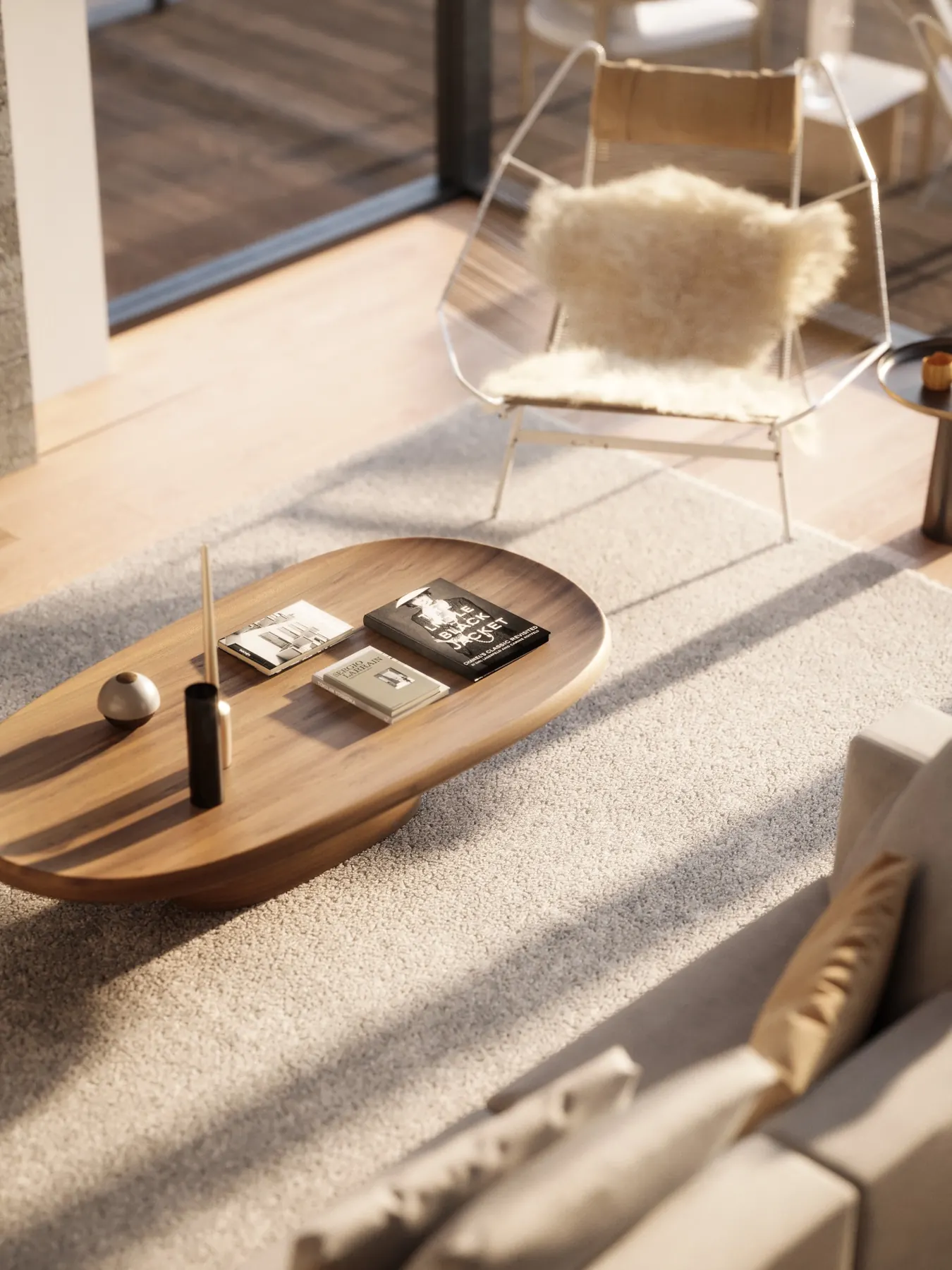 Warm sunlit lounge vignette with sculptural furniture